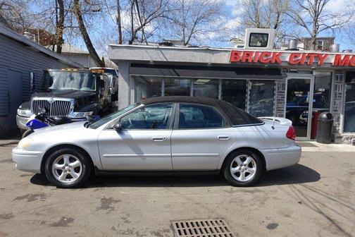 Silver Frost Clearcoat Metallic 2004 Ford Taurus SES