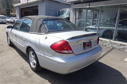 Silver Frost Clearcoat Metallic 2004 Ford Taurus SES