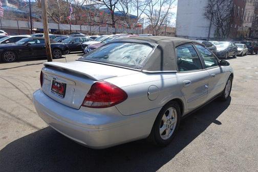 Silver Frost Clearcoat Metallic 2004 Ford Taurus SES