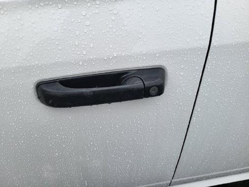 Bright White Clearcoat 2024 RAM 1500 Classic SLT