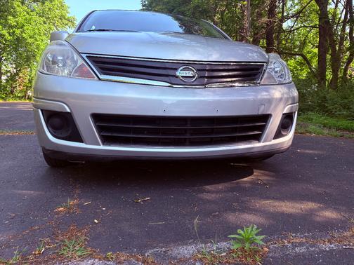 silver 2010 Nissan Versa 1.8 S