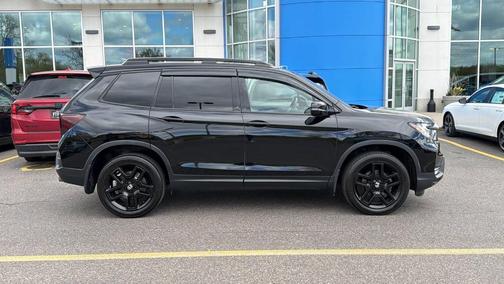 White 2023 Honda Passport Elite