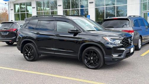 White 2023 Honda Passport Elite