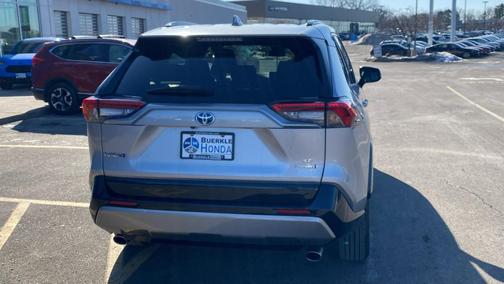Silver Sky Metallic 2023 Toyota RAV4 Hybrid SE