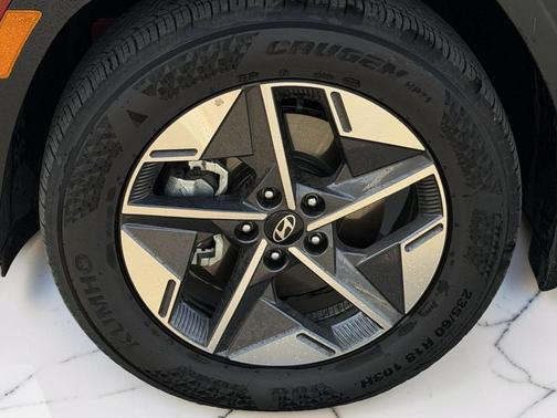 Red 2026 Hyundai TUCSON SEL