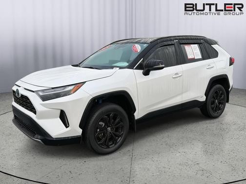 Wind Chill Pearl/Midnight Black Metallic 2024 Toyota RAV4 Hybrid SE