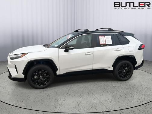 Wind Chill Pearl w/Midnight Black Metallic Roof 2023 Toyota RAV4 Hybrid SE