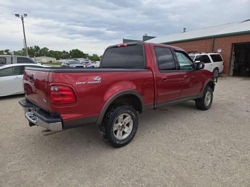 Red 2003 Ford F-150 XLT SuperCrew