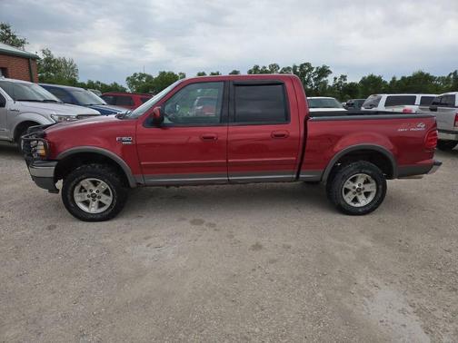 Red 2003 Ford F-150 XLT SuperCrew