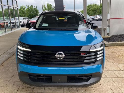 Arctic Ice Blue Metallic/Super Black 2026 Nissan Kicks SR