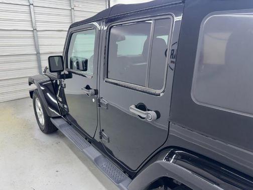 Black 2015 Jeep Wrangler Unlimited Sahara
