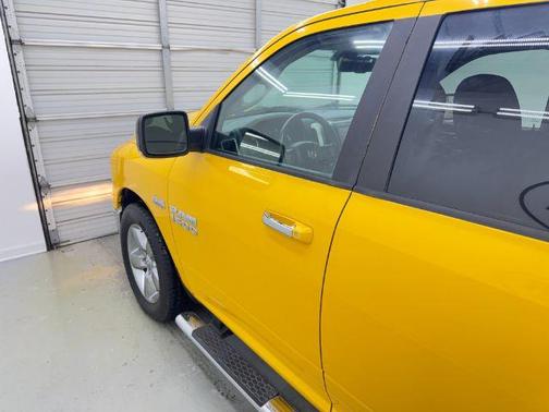 Yellow 2016 RAM 1500 SLT