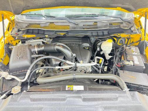 Yellow 2016 RAM 1500 SLT