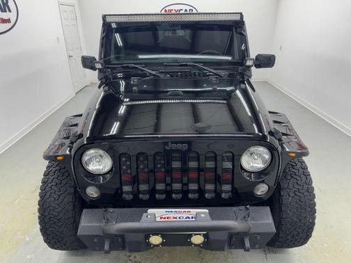 Black 2015 Jeep Wrangler Unlimited Sport