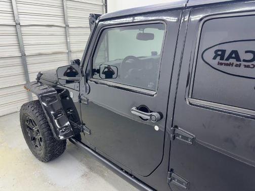 Black 2015 Jeep Wrangler Unlimited Sport