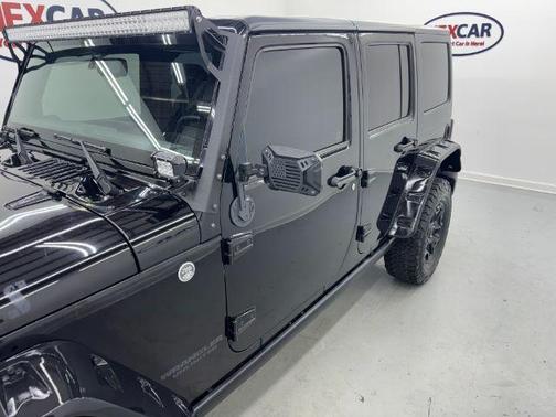 Black 2015 Jeep Wrangler Unlimited Sport