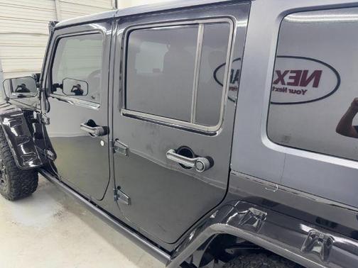 Black 2015 Jeep Wrangler Unlimited Sport