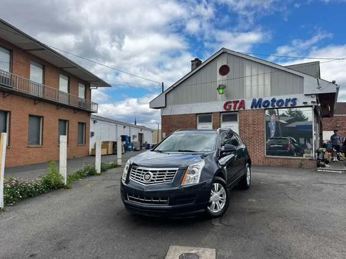 Sapphire Blue Metallic 2016 Cadillac SRX Luxury Collection