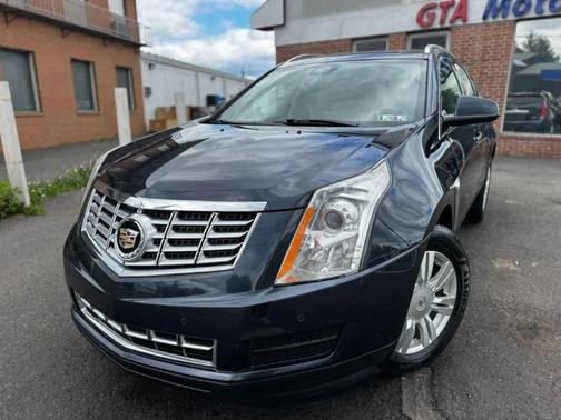 Sapphire Blue Metallic 2016 Cadillac SRX Luxury Collection