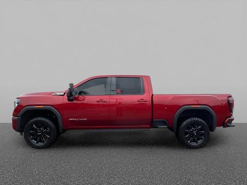 Volcanic Red Tintcoat 2026 GMC Sierra 2500 AT4
