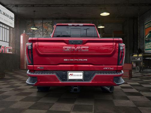 Volcanic Red Tintcoat 2026 GMC Sierra 2500 AT4