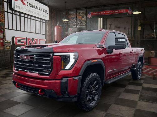 Volcanic Red Tintcoat 2026 GMC Sierra 2500 AT4