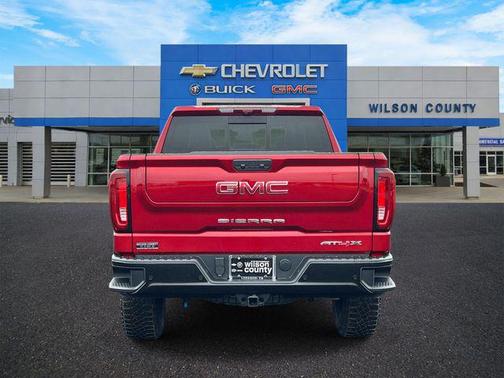 Volcanic Red Tintcoat 2026 GMC Sierra 1500 AT4X