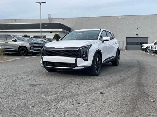 Snow White Pearl 2026 Kia Carnival Hybrid SX Prestige