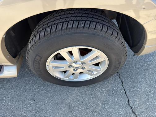 Red Fire Clearcoat Metallic 2006 Ford Explorer Eddie Bauer