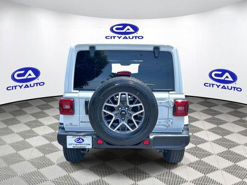 Bright White Clearcoat 2025 Jeep Wrangler 4-Door Sahara 4x4