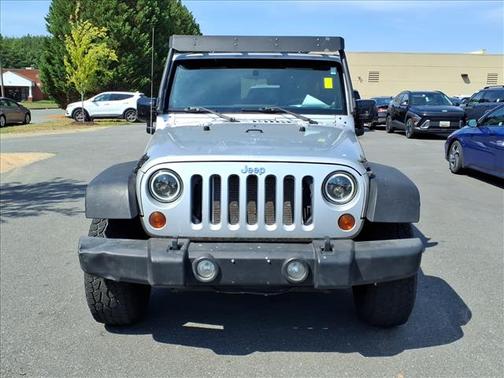 Bright Silver Clearcoat Metallic 2011 Jeep Wrangler Unlimited Sport