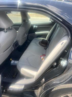 Midnight Black Metallic 2024 Toyota Camry Hybrid SE