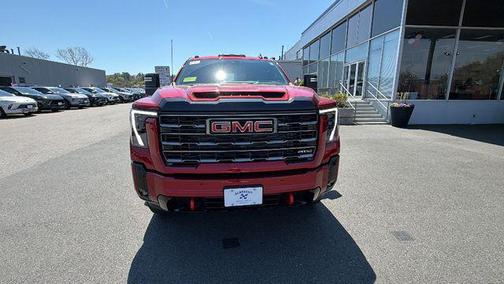 Volcanic Red Tintcoat 2026 GMC Sierra 2500 AT4