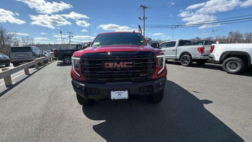 Volcanic Red Tintcoat 2026 GMC Sierra 1500 AT4X