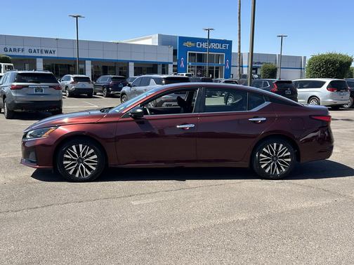 Garnet Pearl Metallic 2024 Nissan Altima 2.5 SV