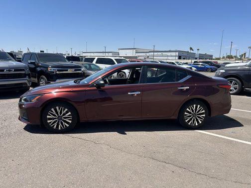 Garnet Pearl Metallic 2024 Nissan Altima 2.5 SV