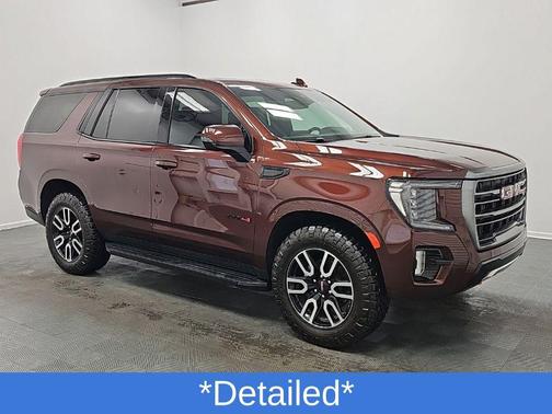 Redwood Metallic 2023 GMC Yukon 4WD AT4