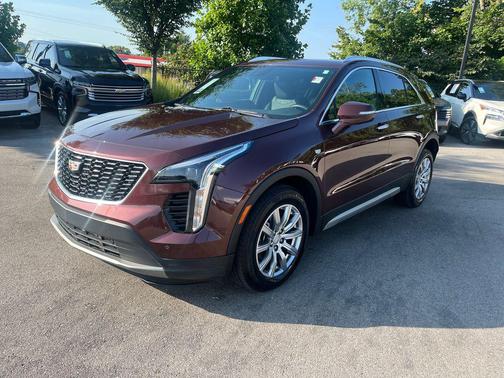 Rosewood Metallic 2023 Cadillac XT4 Premium Luxury