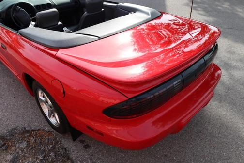 Red 1997 Pontiac Firebird Formula