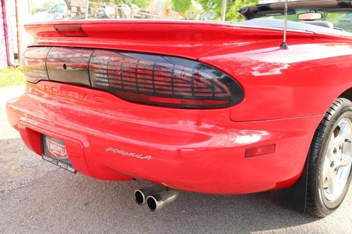 Red 1997 Pontiac Firebird Formula