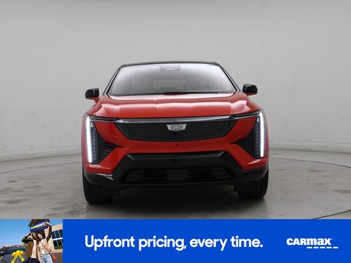 Orange 2026 Cadillac OPTIQ Premium Sport
