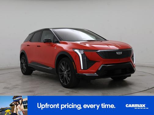 Orange 2026 Cadillac OPTIQ Premium Sport