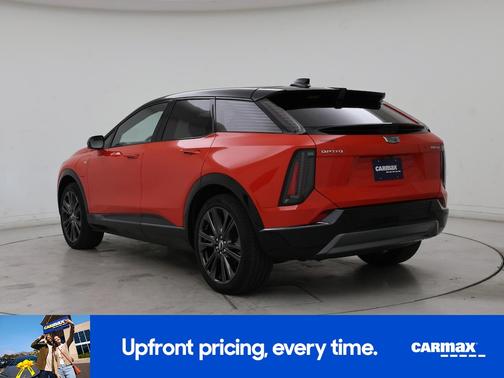 Orange 2026 Cadillac OPTIQ Premium Sport