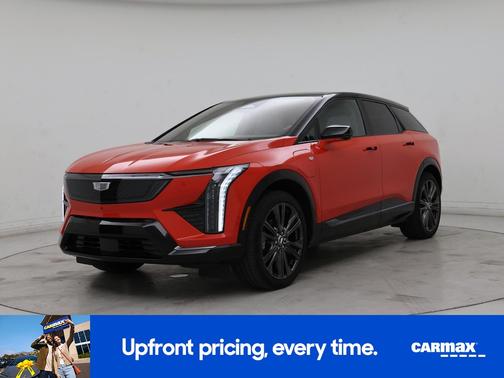 Orange 2026 Cadillac OPTIQ Premium Sport