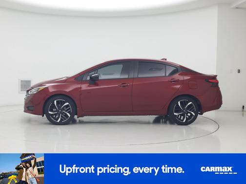 Red 2024 Nissan Versa SR