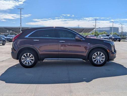 Rosewood Metallic 2023 Cadillac XT4 Premium Luxury