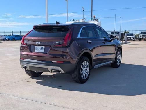 Rosewood Metallic 2023 Cadillac XT4 Premium Luxury