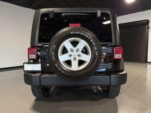 Black 2016 Jeep Wrangler Unlimited Sport
