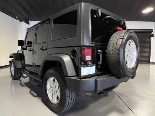 Black 2016 Jeep Wrangler Unlimited Sport
