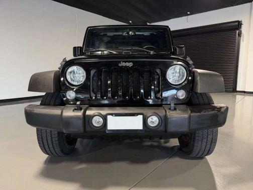 Black 2016 Jeep Wrangler Unlimited Sport